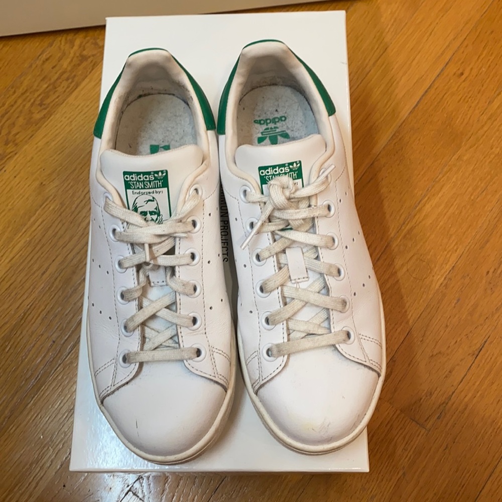 White and green adidas Stan smiths